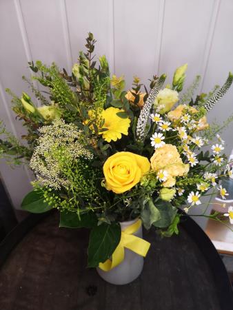 this arrangement consists bright yellow flowers, perfectly arranged in one of our popular eco vases.

designed in  at our award winning blairgowrie shop, this arrangement is finished off with a hand written note card.

this popular choice is sure to cheer up your day with those bright yellow flowers.

our flowers are fresh and seasonal which means that substitutions within our bouquets will sometimes have to be made where necessary.  please note as with all natural products there may be slight v Something Special Flowers Blairgowrie 01250 873237