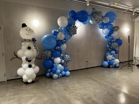 this is mr. jack, the snowman standing next to his winter wonder land 25ft arch for googles employee holiday party!!! Balloon Specialties Santa Rosa (415)858-4427