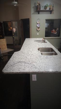 Custom Granite Island in White Rose, with Demi Bullnose Edges. Red River Granite Importers Oklahoma City (580)595-0564