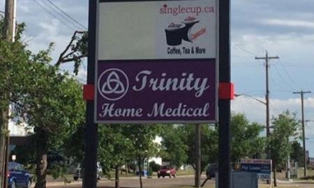 99 Street Pillar sign Trinity Home Medical Edmonton (780)462-0009