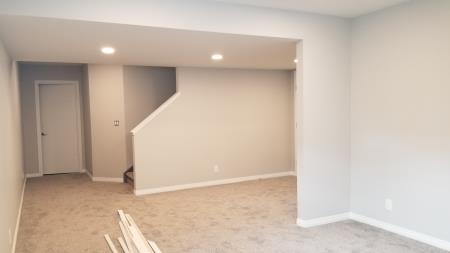 an airdrie basement drywalled development including bulkheads around ducting. smooth ceiling finish. MD-DRYWALL Incorporated Airdrie (403)880-4767