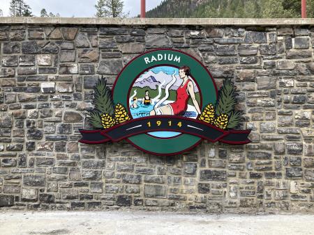 Radium Hot Springs Custom Aluminum Sign is 5 layers thick and weighs 400 pounds, Installed August 2023 Lager Enterprises Delacour (403)660-3817