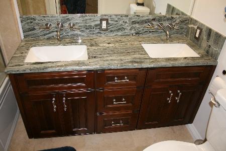 Custom vanity, granite top, undermount Kohler sinks, Newport Brass wall mount faucets. Performance Construction & Remodeling Inc. Chino Hills (714)655-6427