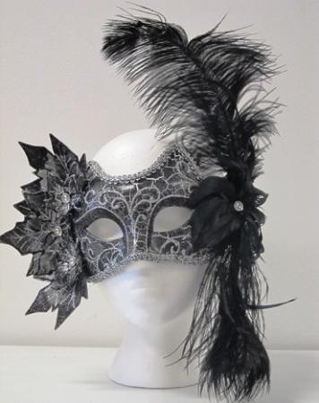 Leaves and feather black & white Mask. Ideal for the bride or quinceanera or any woman at the party. Enjoy your Hora Loca. Party Wholesale Miami (305)220-2241