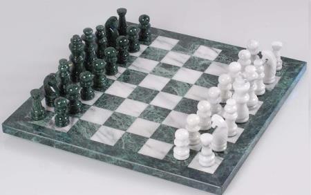 The hand polished marble chessmen comes complete with matching inlaid marble board.<br><br>King Height: 4-1/2?<br><br>Board Size: 18? Square. Quality Games TX Houston (888)886-5834